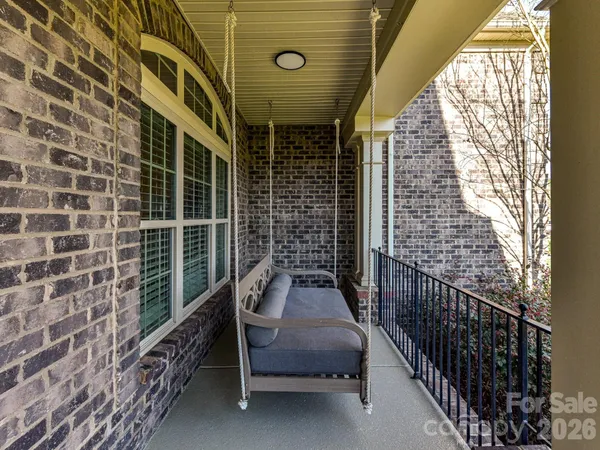 a view of entryway with livingroom and wooden floor