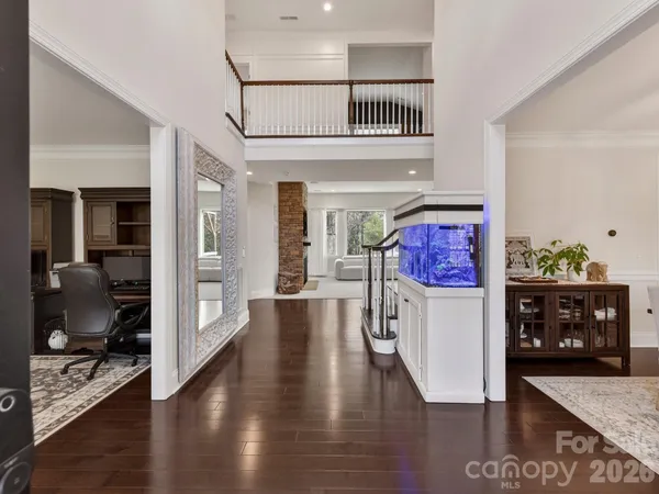 a view of livingroom with furniture window and wooden floor