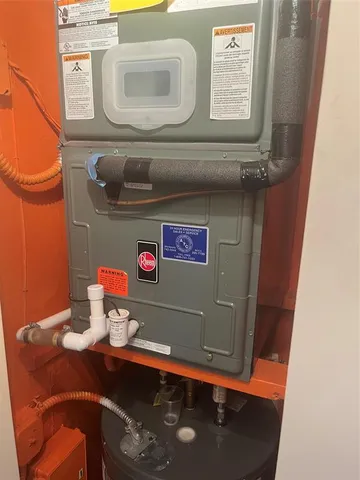 a living room with furniture and window