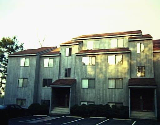 188 Flax Hill Road, Unit C7 Norwalk, CT 06854 - Photo 1 of 1 a front view of a house with a yard