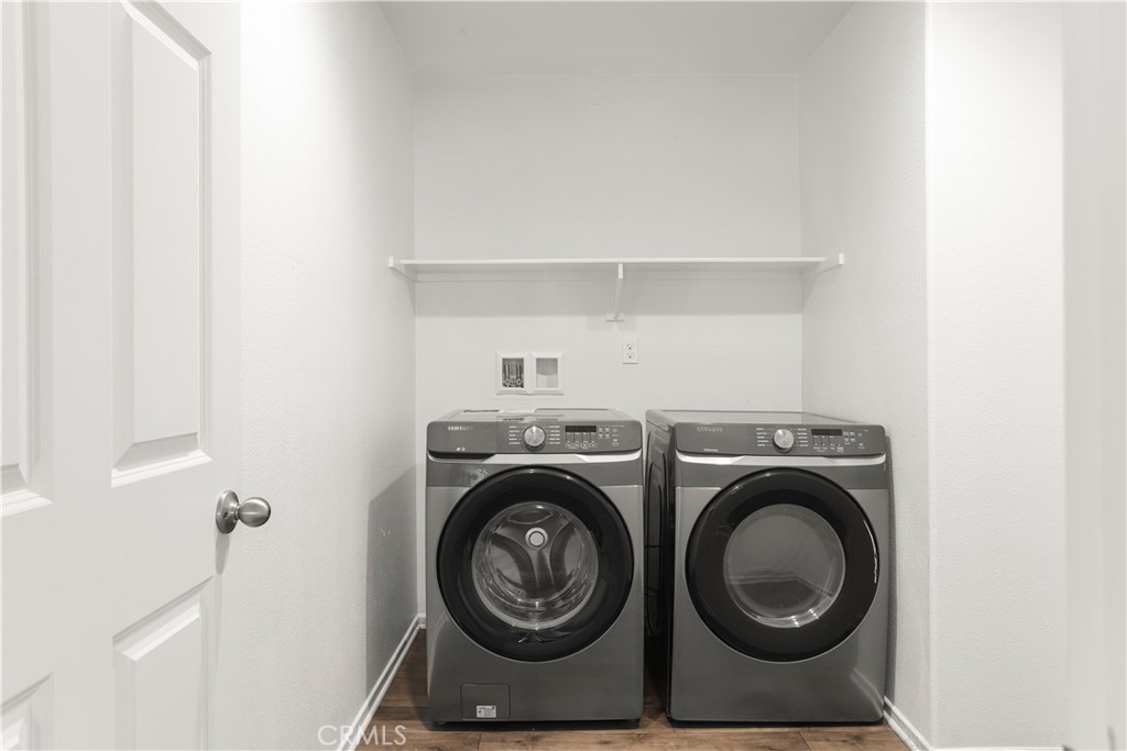 3320 Jack Rabbit Court Perris, CA 92570 - Photo 21 of 42 a utility room with dryer and washer