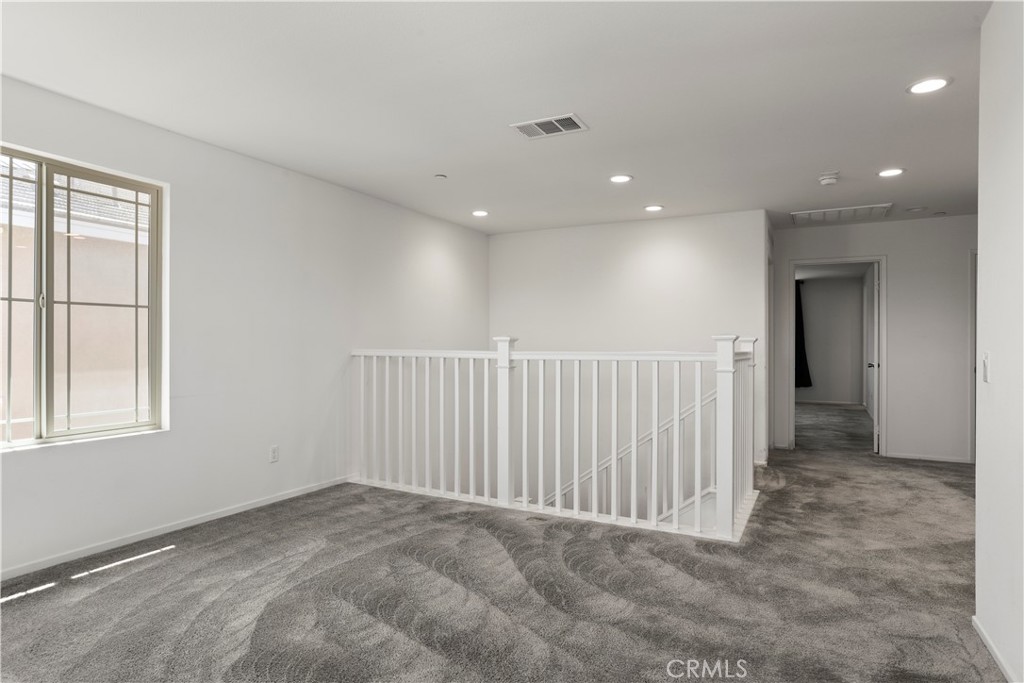 3320 Jack Rabbit Court Perris, CA 92570 - Photo 23 of 42 a view of a livingroom with a staircase