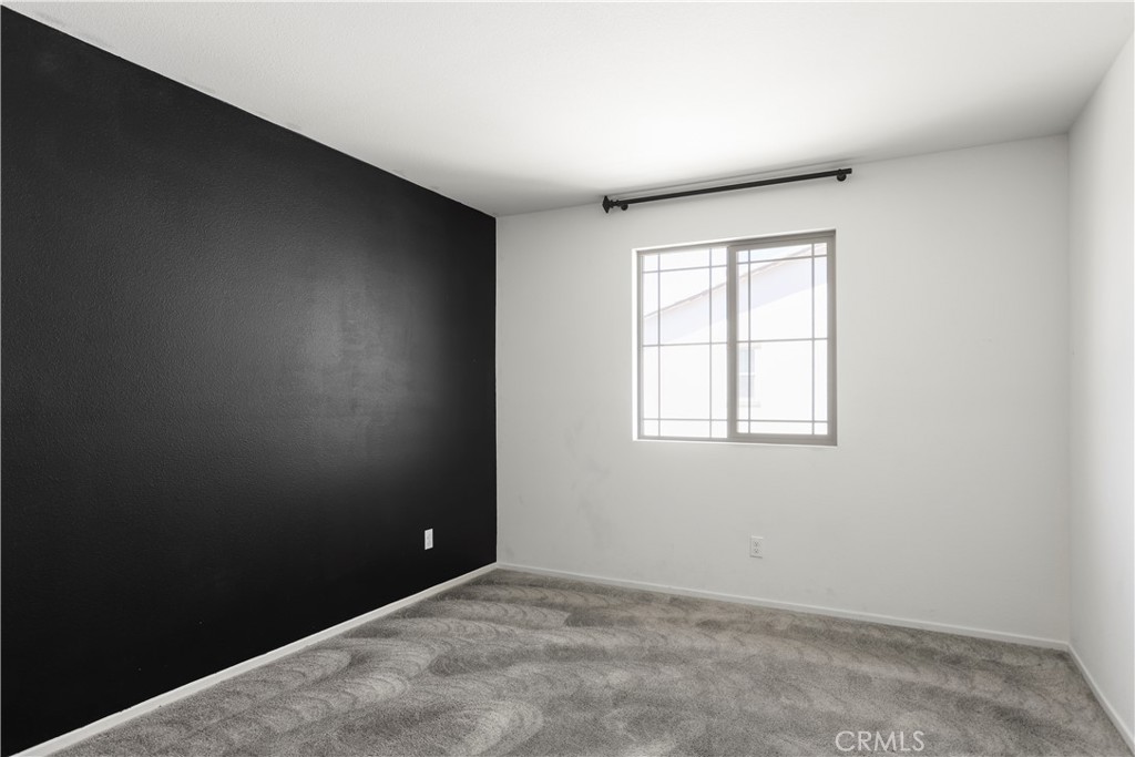 3320 Jack Rabbit Court Perris, CA 92570 - Photo 29 of 42 an empty room with a window