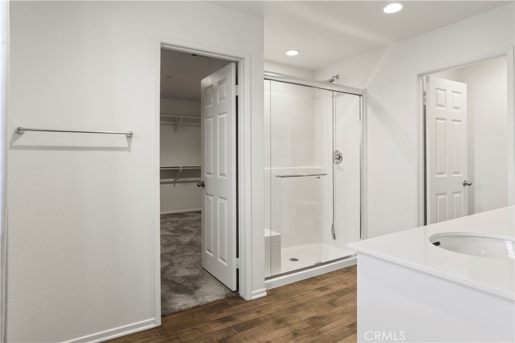 3320 Jack Rabbit Court Perris, CA 92570 - Photo 35 of 42 a view of a bathroom with a shower and a sink