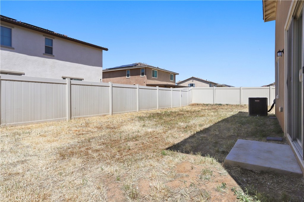 3320 Jack Rabbit Court Perris, CA 92570 - Photo 42 of 42 a front view of a house with a yard