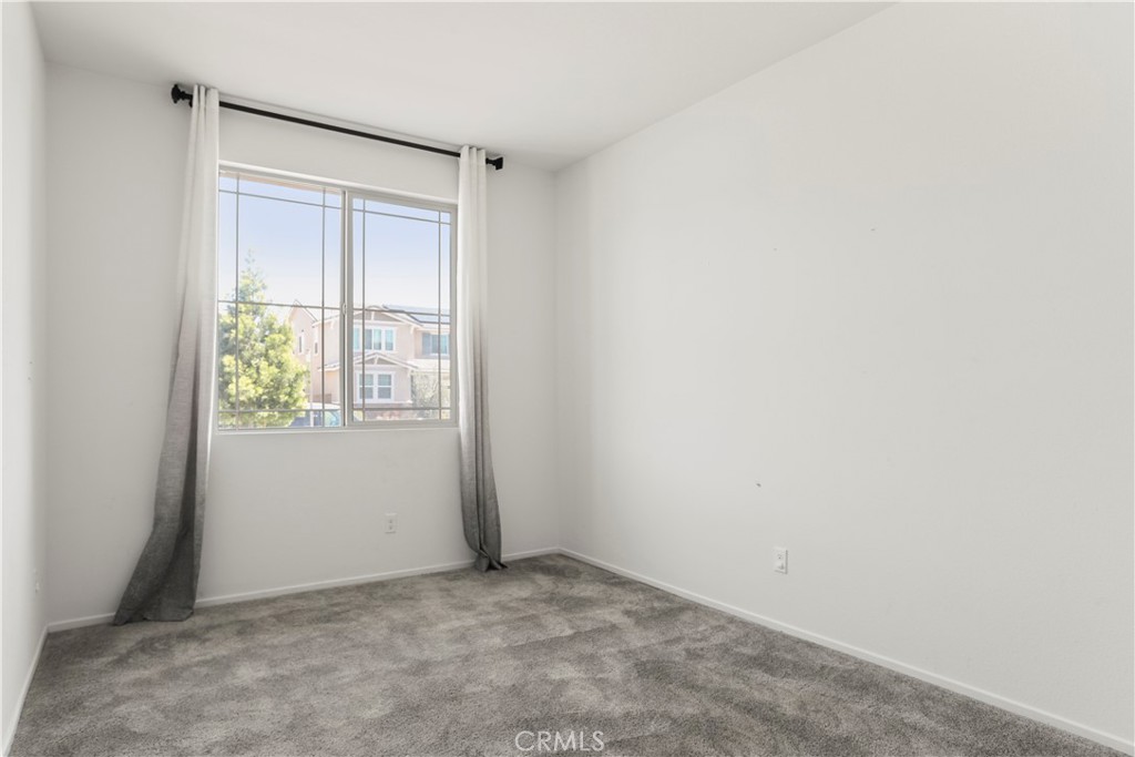 3320 Jack Rabbit Court Perris, CA 92570 - Photo 9 of 42 an empty room with windows