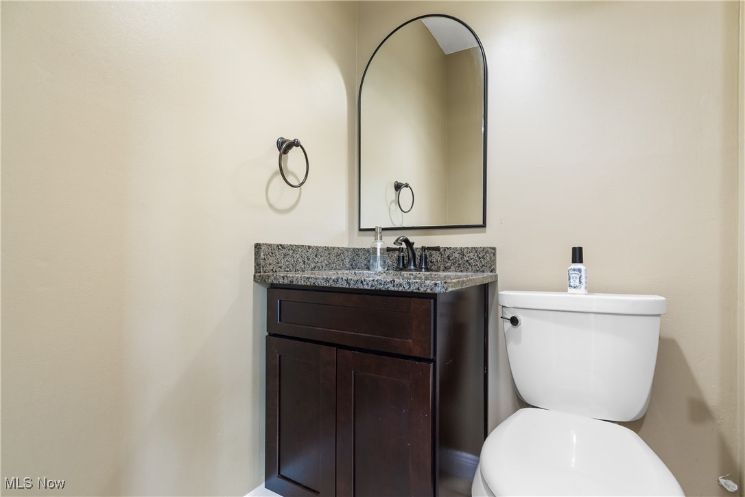 4401 Conestoga Trail Akron, OH 44321 - Photo 15 of 35 Bathroom featuring toilet and vanity