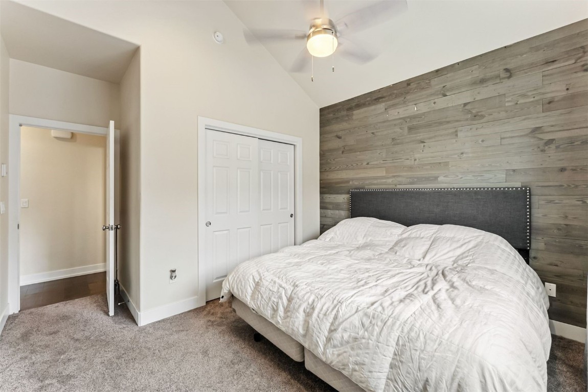 77 Wayback Drive, Unit 77 Keystone, CO 80435 - Photo 15 of 35 a large bed with a wooden floor