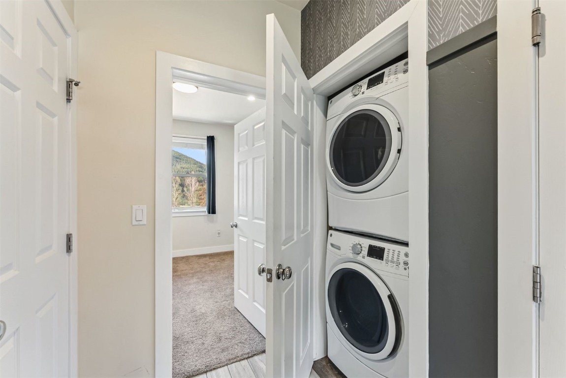 77 Wayback Drive, Unit 77 Keystone, CO 80435 - Photo 20 of 35 a utility room with dryer and washer