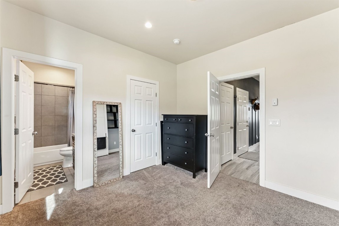 77 Wayback Drive, Unit 77 Keystone, CO 80435 - Photo 22 of 35 walk in closet with white walls