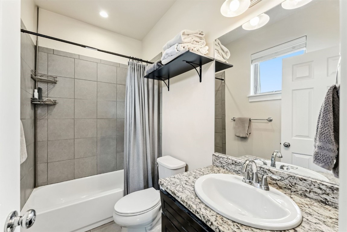 77 Wayback Drive, Unit 77 Keystone, CO 80435 - Photo 24 of 35 a bathroom with a sink toilet tub and shower
