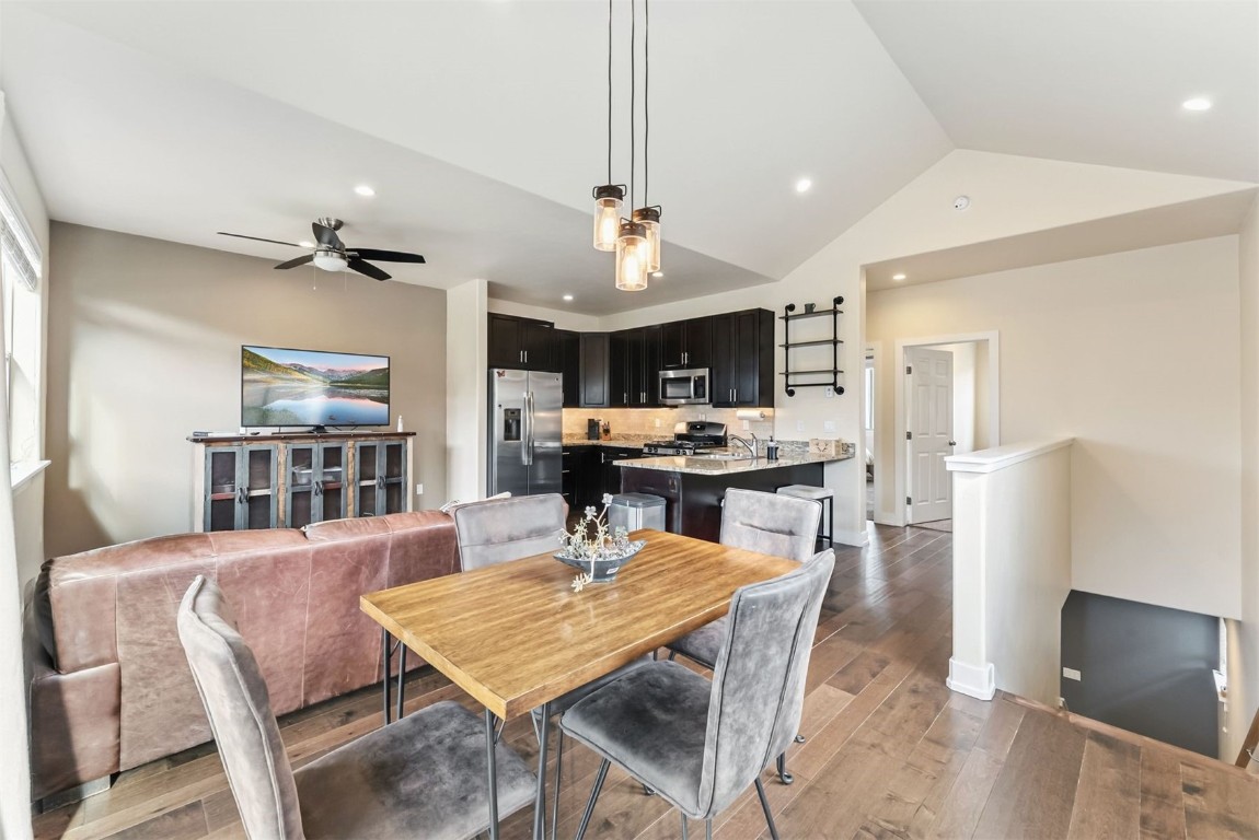 77 Wayback Drive, Unit 77 Keystone, CO 80435 - Photo 7 of 35 a view of a dining room with furniture and a chandelier