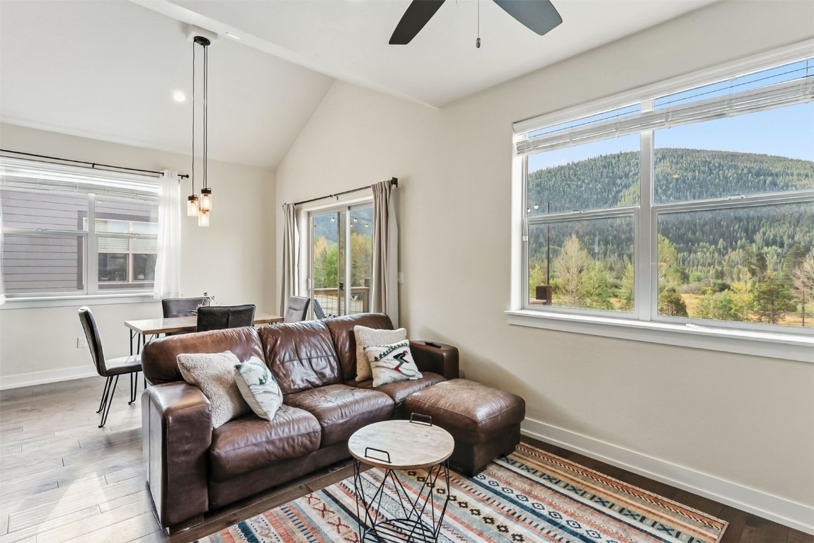 77 Wayback Drive, Unit 77 Keystone, CO 80435 - Photo 10 of 35 a living room with furniture and a large window