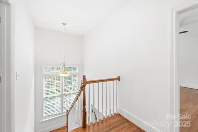 a view of hallway with windows