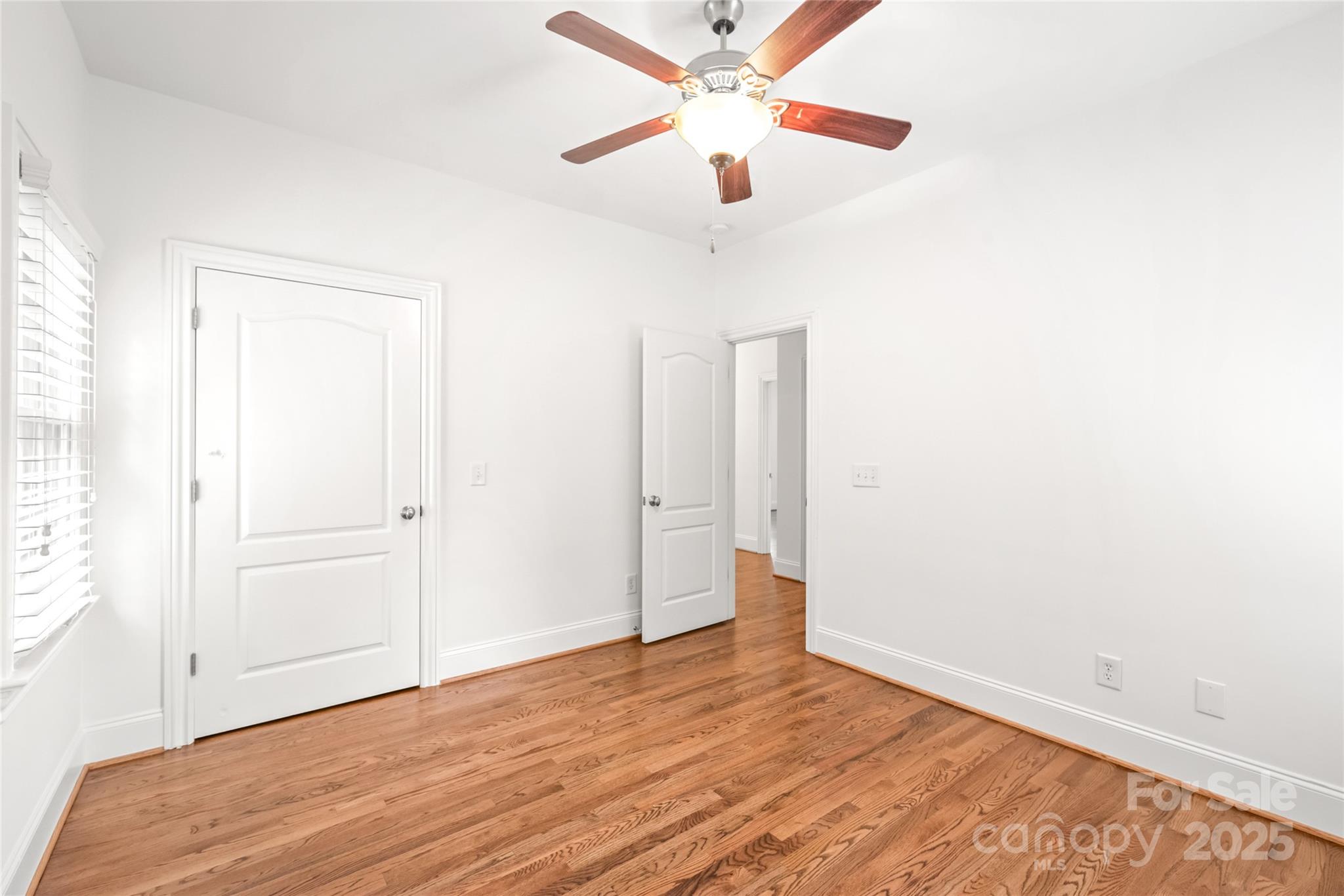 915 Millbrook Road Charlotte, NC 28211 - Photo 30 of 39 a view of empty room with wooden floor