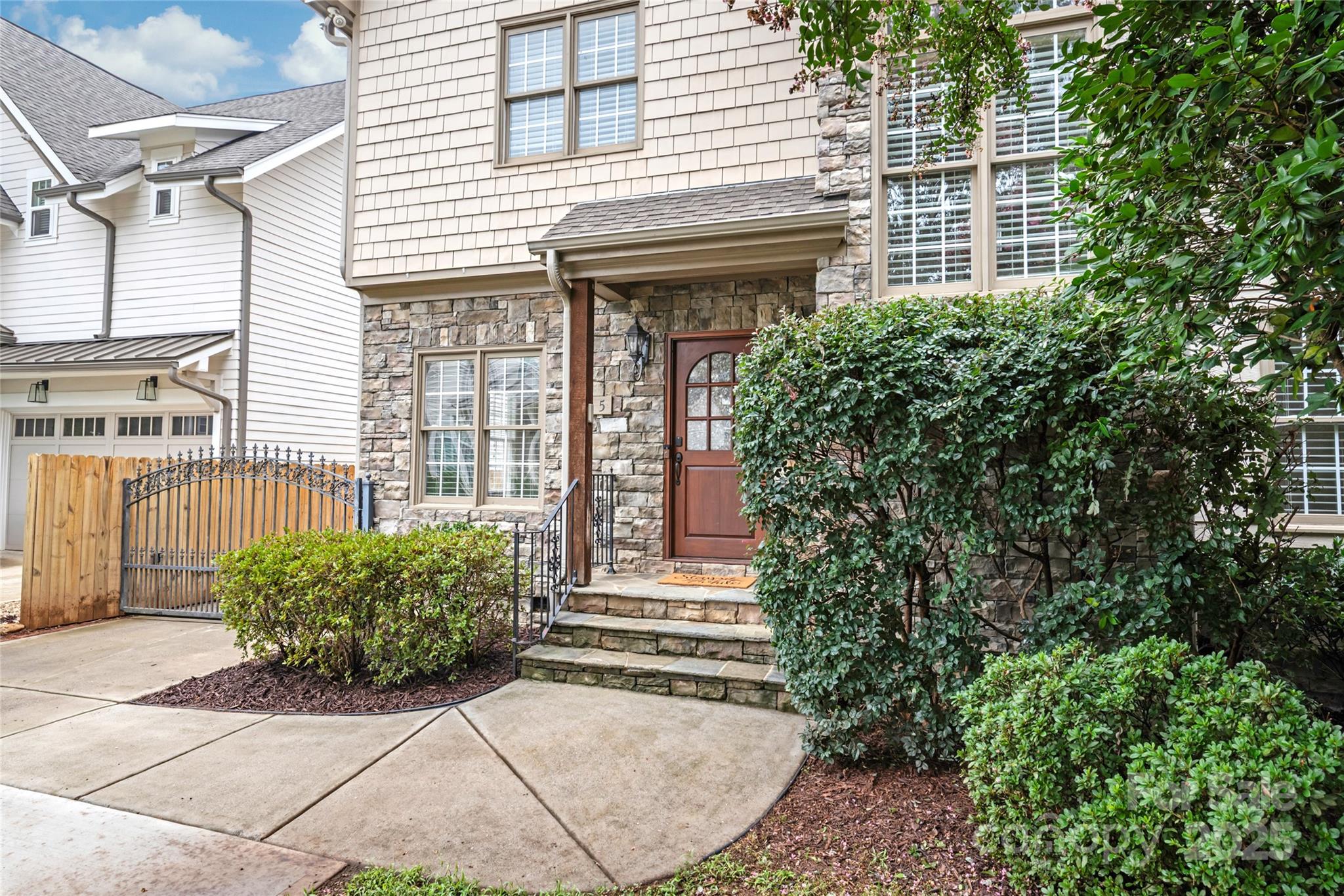 915 Millbrook Road Charlotte, NC 28211 - Photo 3 of 39 a front view of a house