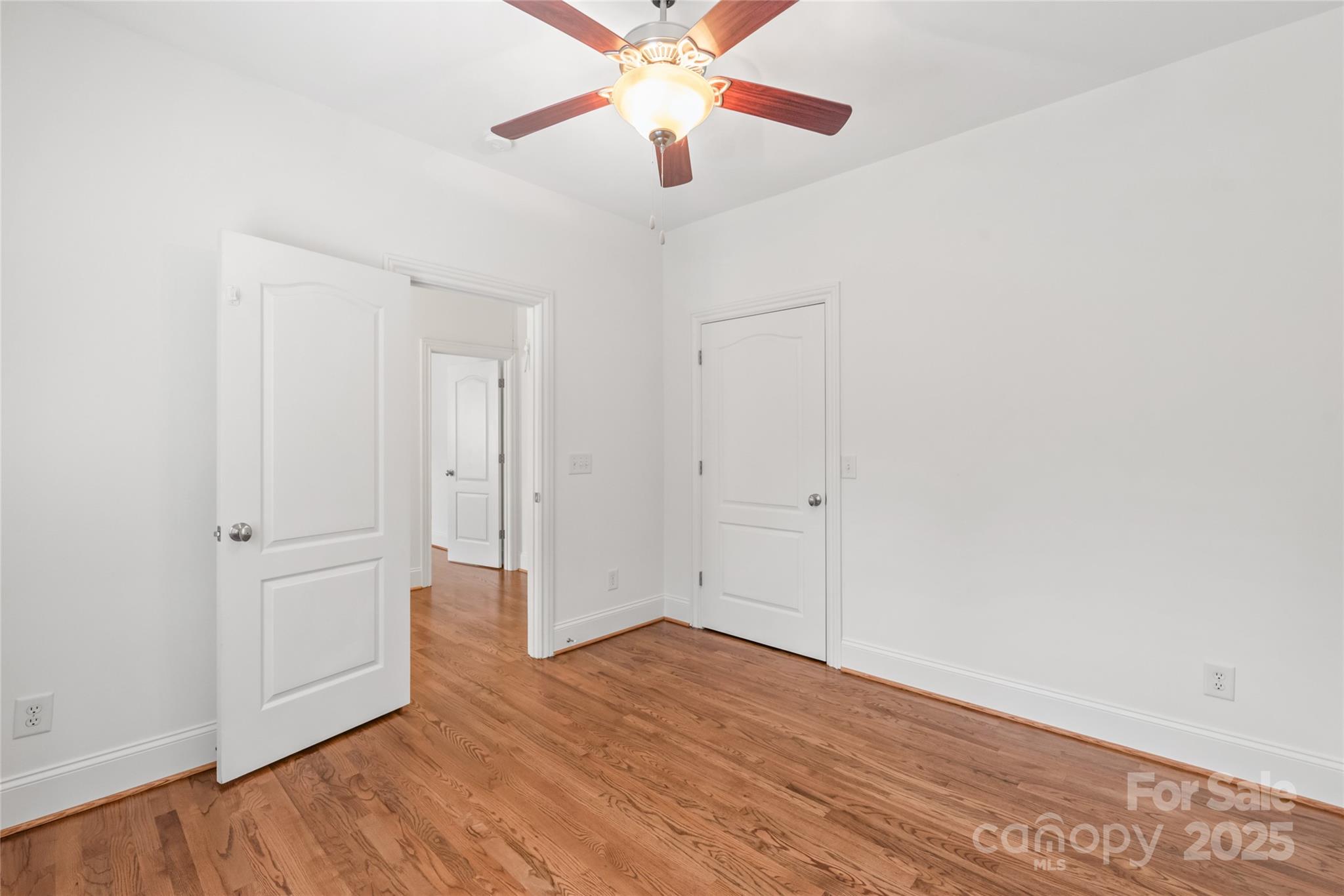 915 Millbrook Road Charlotte, NC 28211 - Photo 33 of 39 wooden floor in an empty room