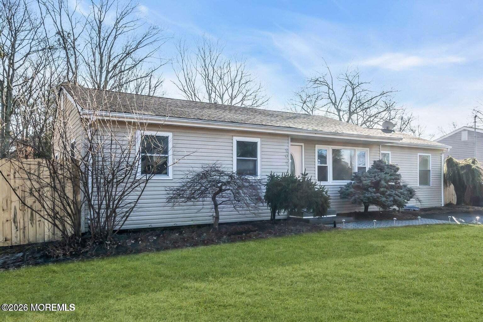 905 Harrison Road Toms River, NJ 08753 - Photo 2 of 34 front view of a house with a yard