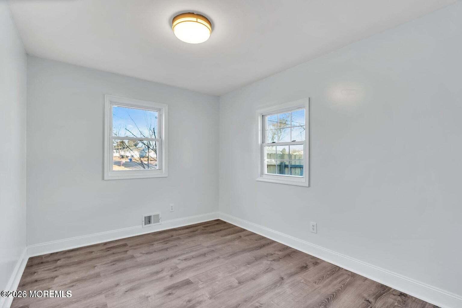 905 Harrison Road Toms River, NJ 08753 - Photo 24 of 34 an empty room with a window