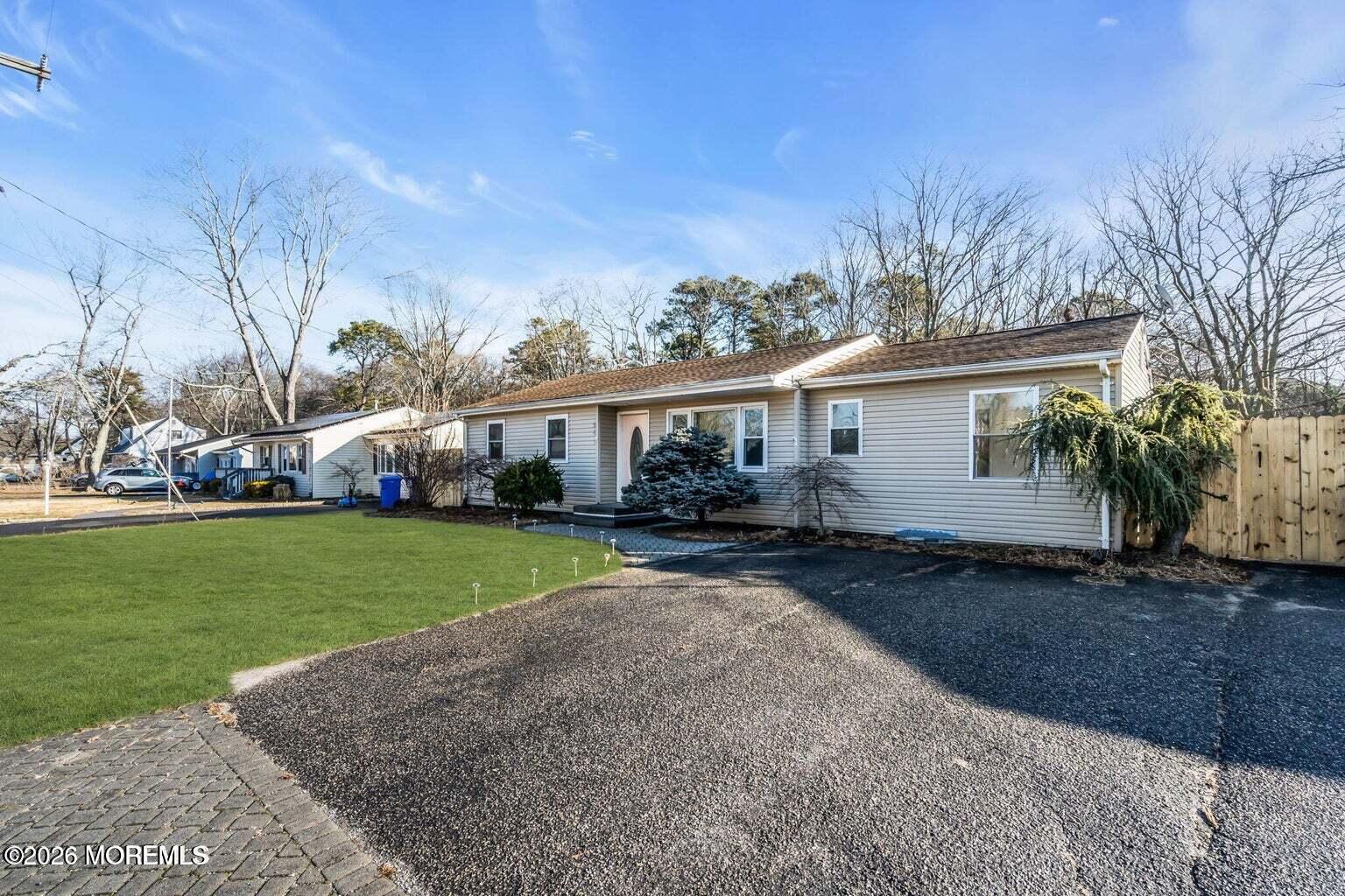 905 Harrison Road Toms River, NJ 08753 - Photo 7 of 34 a front view of house with yard and green space