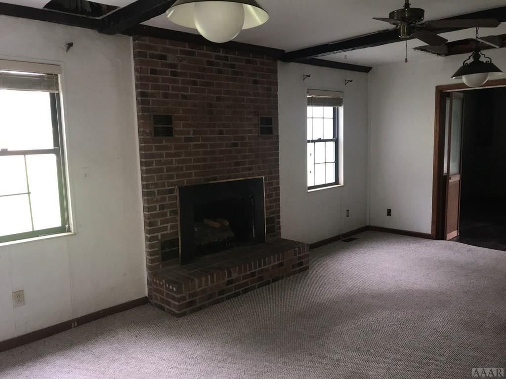 1253 Northside Road Elizabeth City, NC 27909 - Photo 7 of 24 Den with fireplace