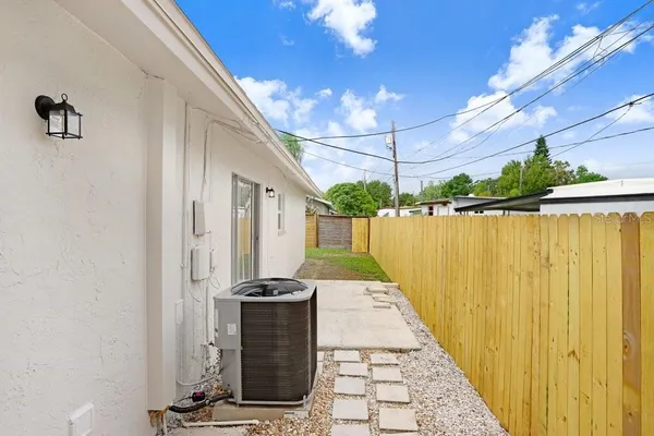 a view of a pathway with a patio