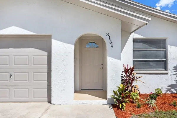 a front view of a house with entryway
