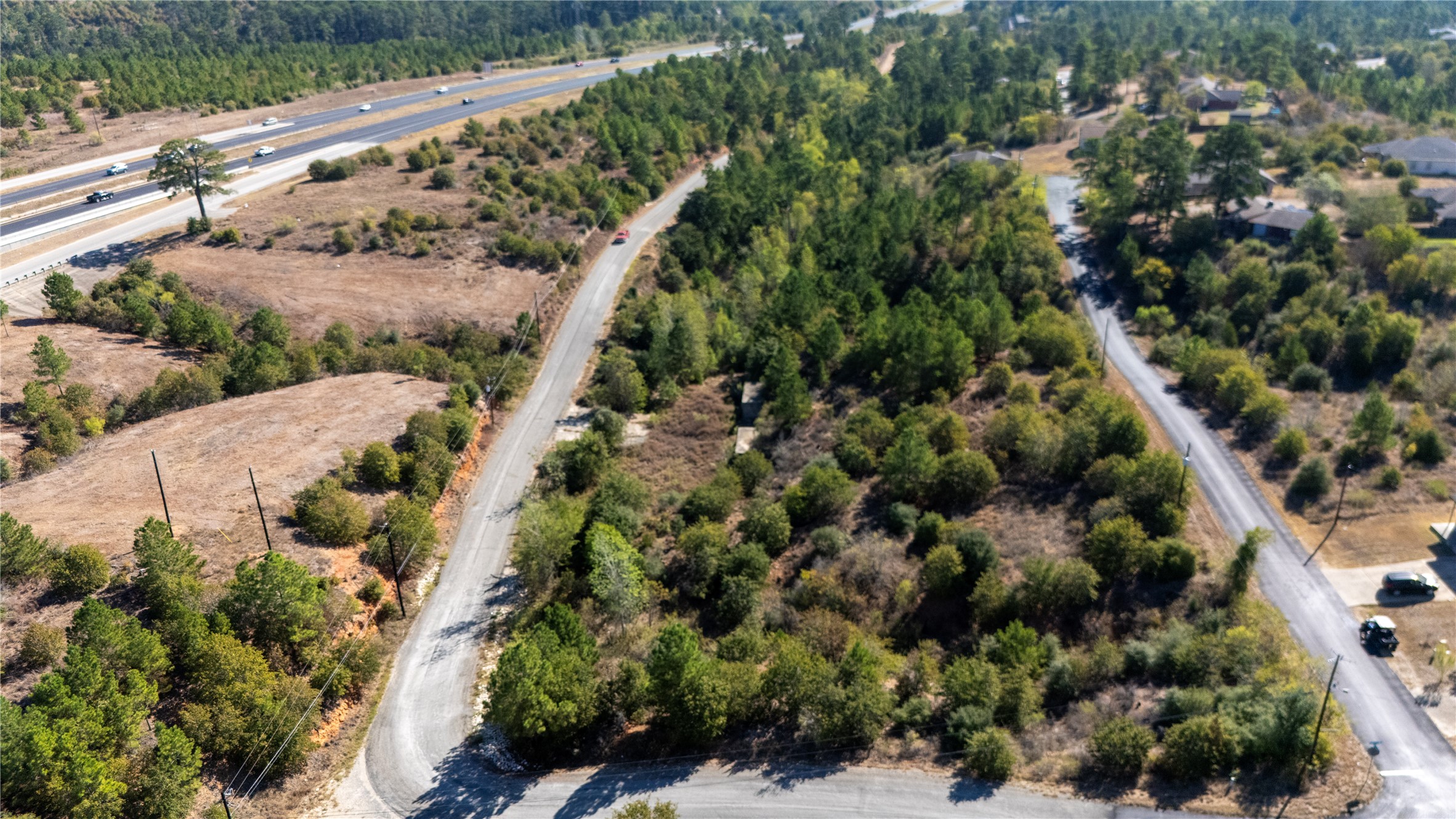 Tbd Aloha Lane Bastrop, TX 78602 - Photo 6 of 20 an aerial view of a residential houses with outdoor space and trees