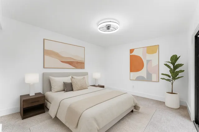 a view of an empty room and a window