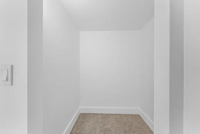 a view of hallway with closet