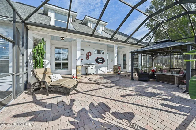 a view of a lake with houses in the back