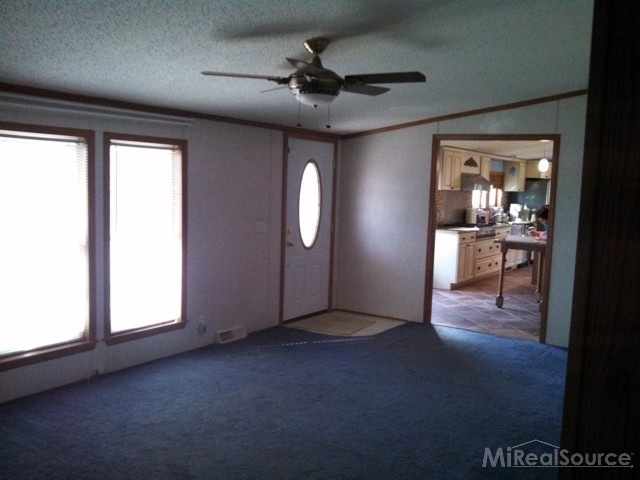 1580 Stapleton Road Goodells, MI 48027 - Photo 6 of 22 This is a view of the living room.