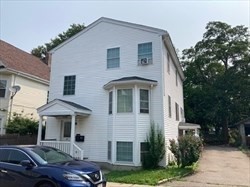 5 Shafter Street, Unit 1 Boston, MA 02121 - Photo 1 of 5 a front view of a house with a garden
