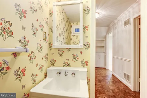 a bathroom with a bathtub and shower curtain