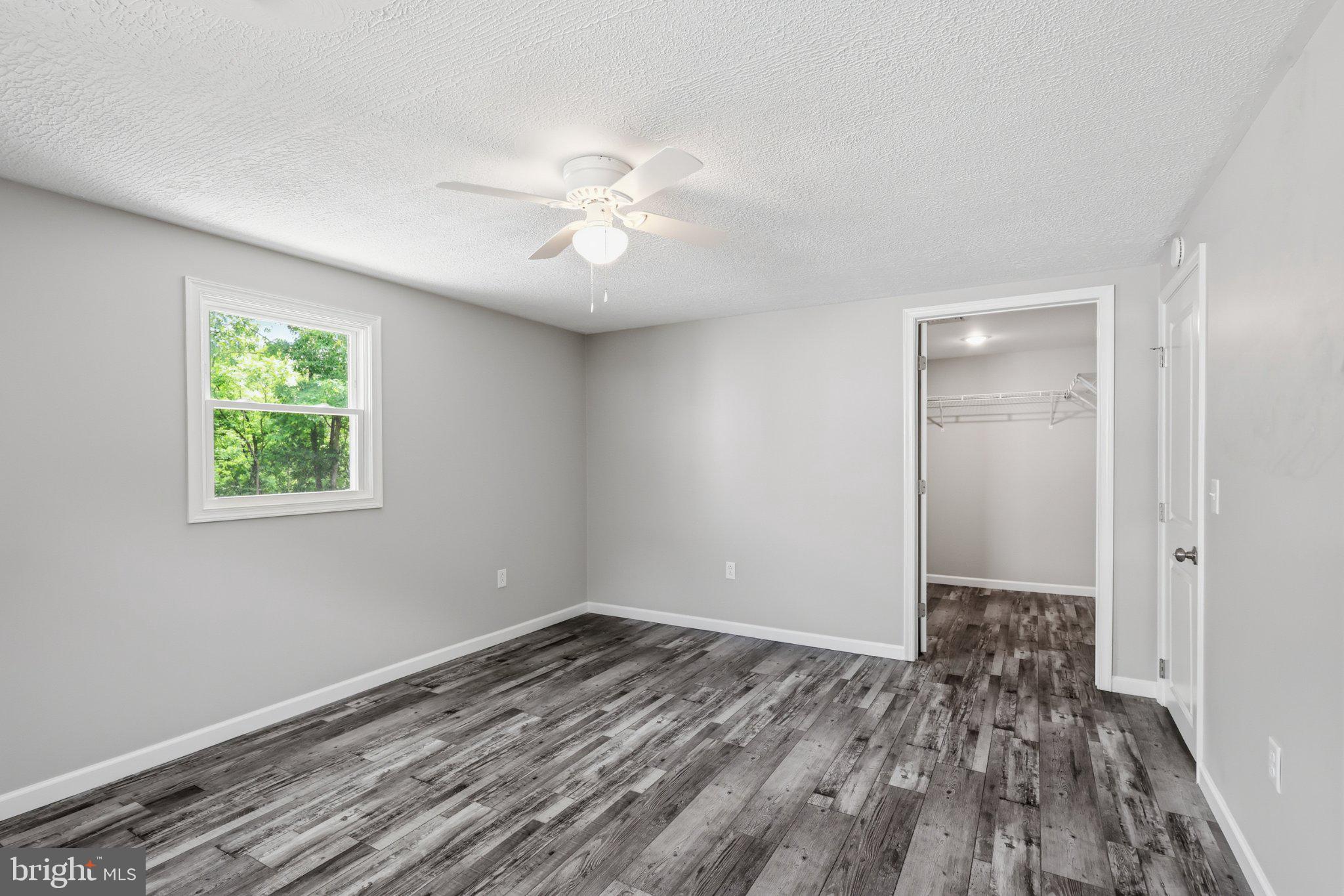 125 Ashland Drive Ridgeley, WV 26753 - Photo 24 of 41 Bright and airy modern bedroom space.