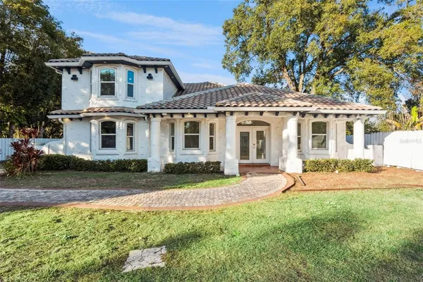 front view of a house with a yard