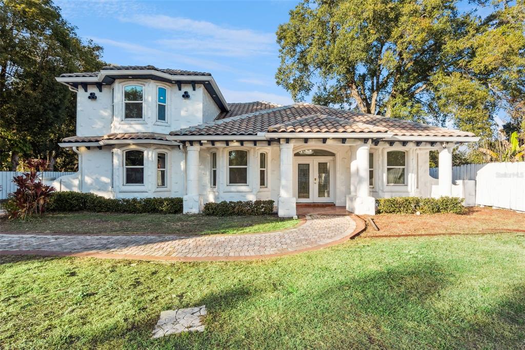 front view of a house with a yard