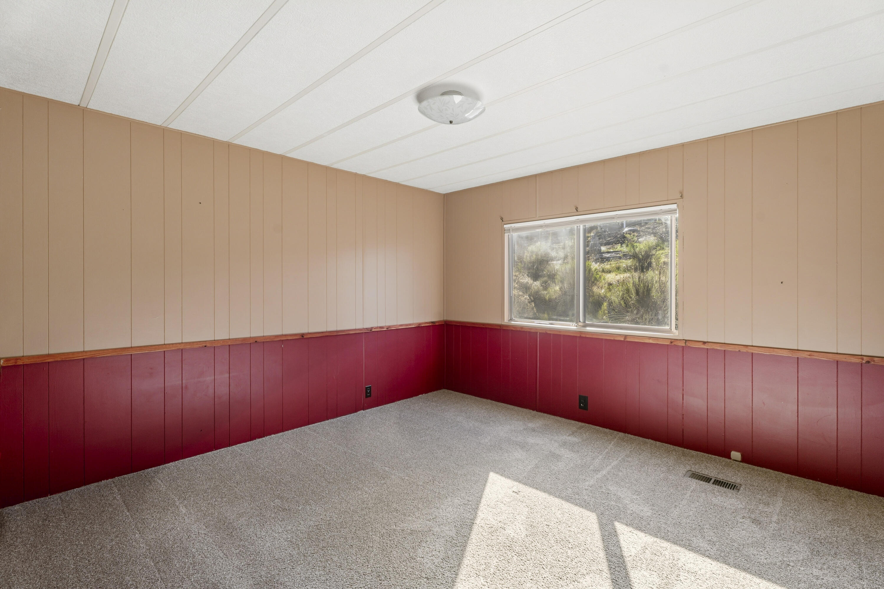 9318 Southwest Panorama Road Terrebonne, OR 97760 - Photo 22 of 45 an empty room with windows