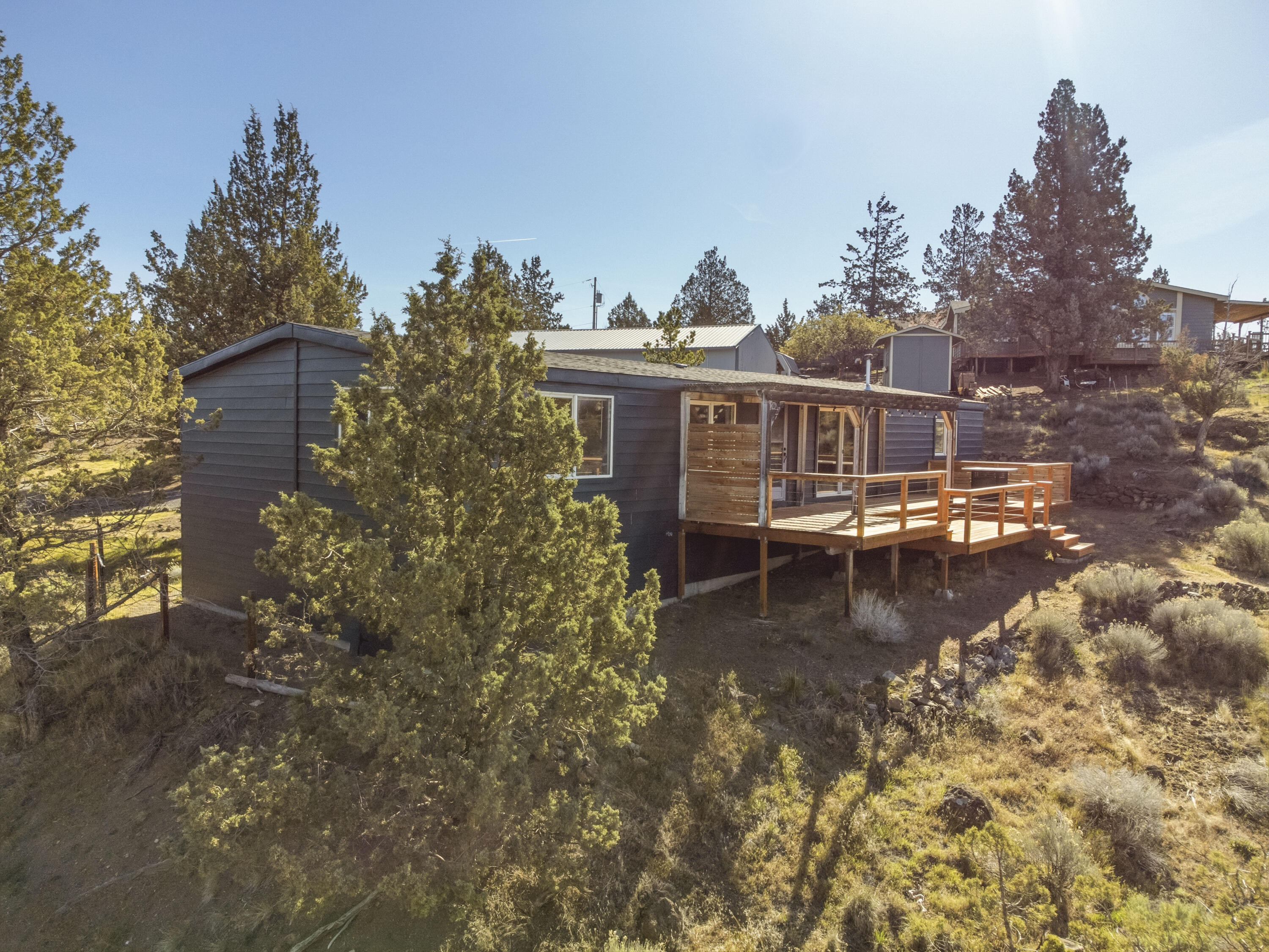 9318 Southwest Panorama Road Terrebonne, OR 97760 - Photo 35 of 45 a view of a house with roof yard