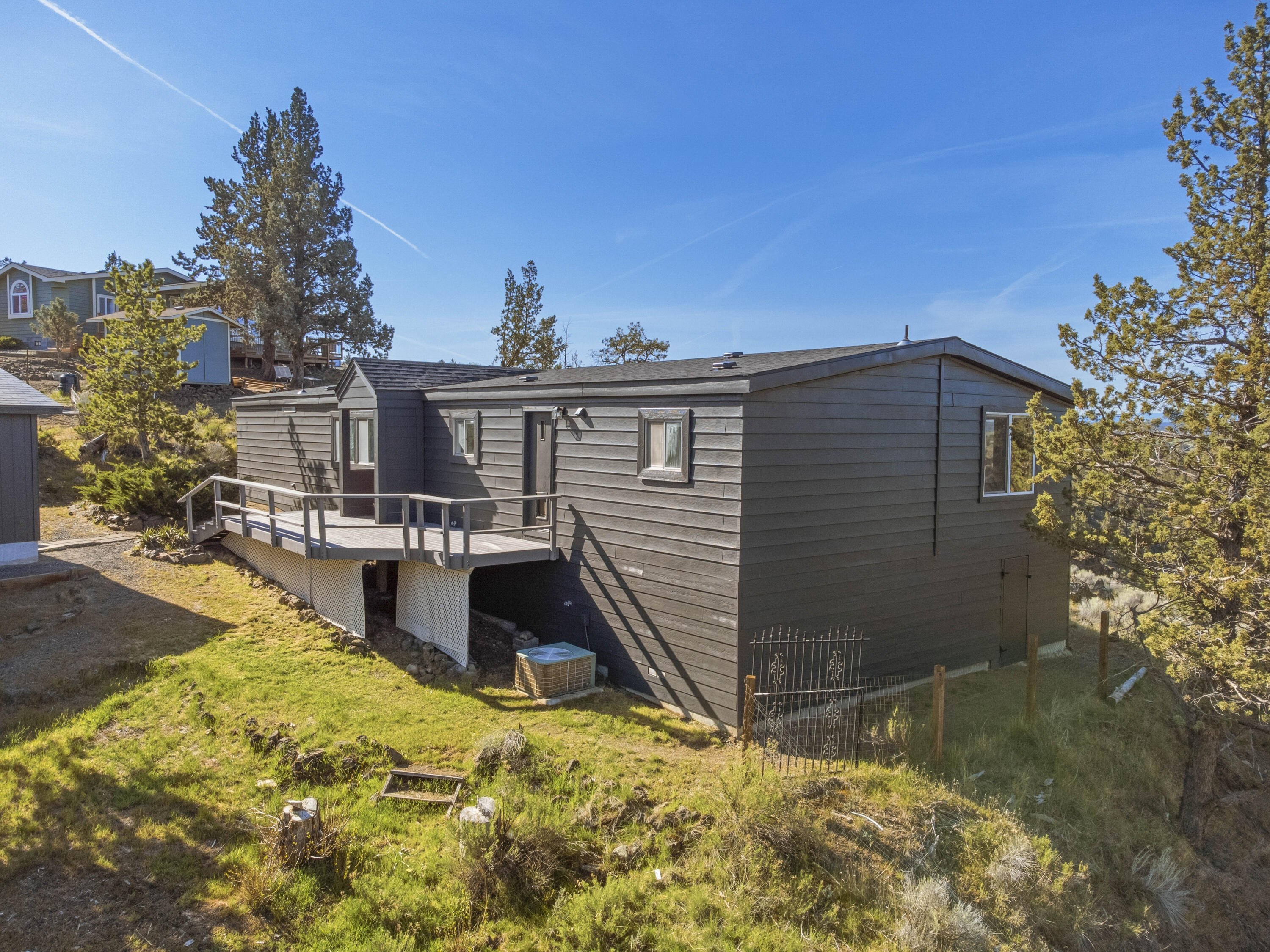 9318 Southwest Panorama Road Terrebonne, OR 97760 - Photo 36 of 45 a view of a house with wooden fence