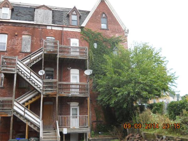 184 Maple Street Springfield, MA 01103 - Photo 3 of 11 a front view of a house