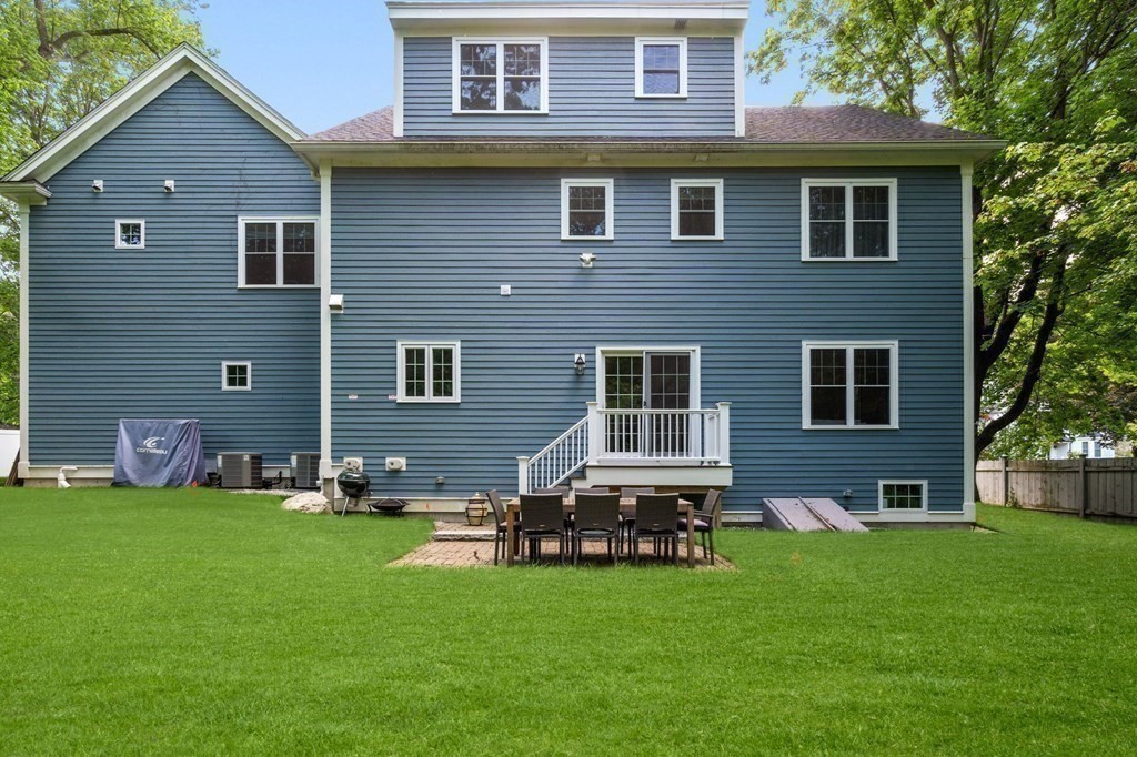116 School Street Lexington, MA 02421 - Photo 29 of 33 a front view of house with yard and outdoor seating