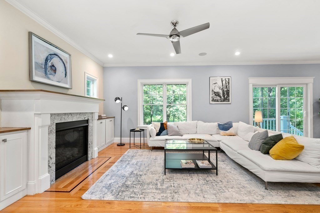 116 School Street Lexington, MA 02421 - Photo 5 of 33 a living room with furniture and a fireplace