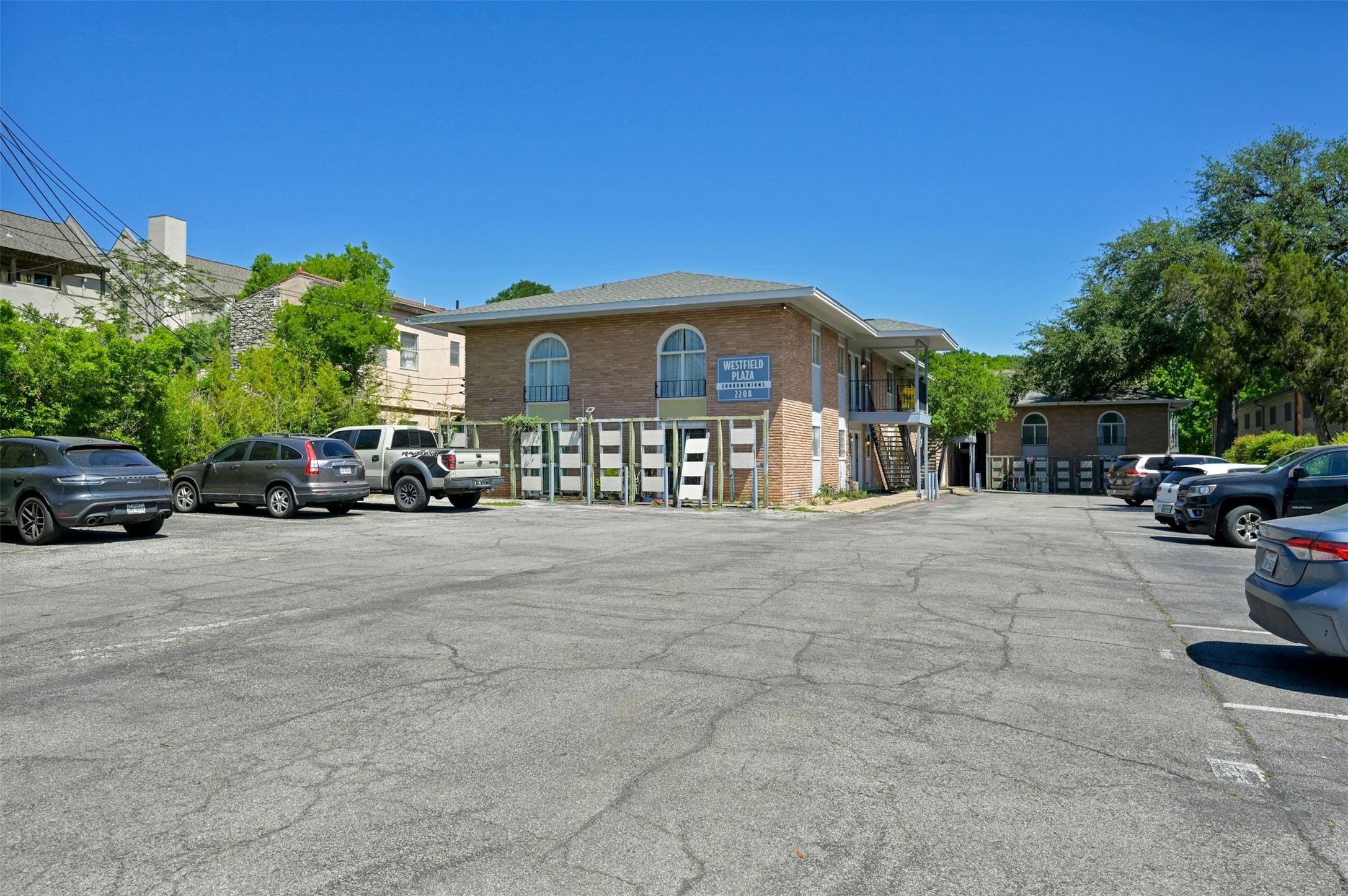 2208 Enfield Road, Unit 106 Austin, TX 78703 - Photo 1 of 1 Taken from close to Enfield Road looking toward the complex