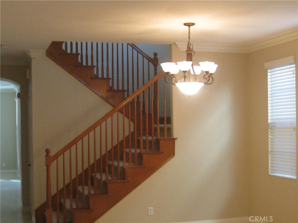 19 Coriander Irvine, CA 92603 - Photo 16 of 40 a view of entryway and hall with wooden floor