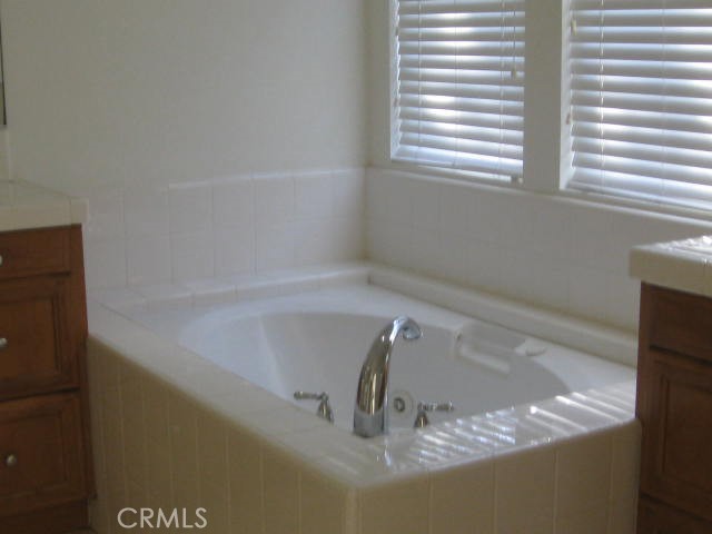 19 Coriander Irvine, CA 92603 - Photo 19 of 40 a bath tub sitting in a bathroom