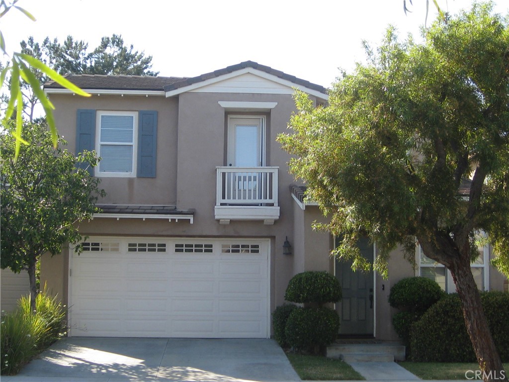 19 Coriander Irvine, CA 92603 - Photo 2 of 40 a front view of a house with a garden