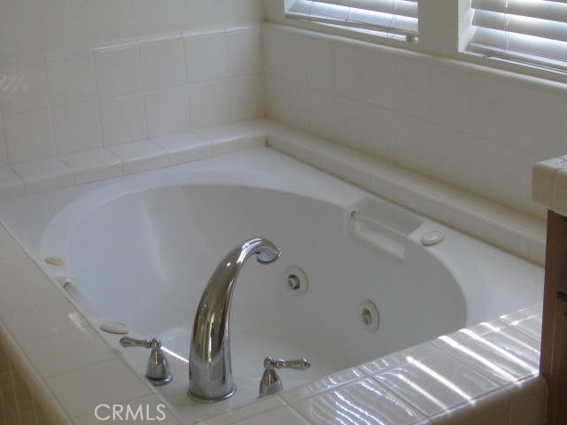 19 Coriander Irvine, CA 92603 - Photo 21 of 40 a bathroom with a shower