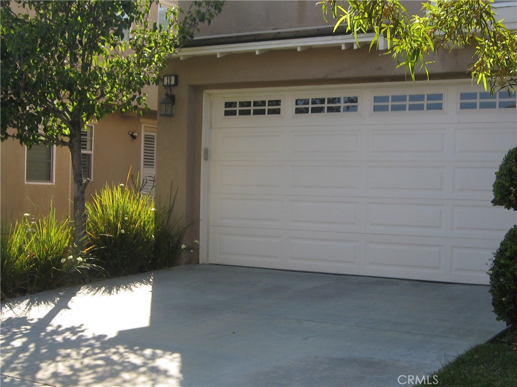 19 Coriander Irvine, CA 92603 - Photo 3 of 40 a view of a house with a flower garden