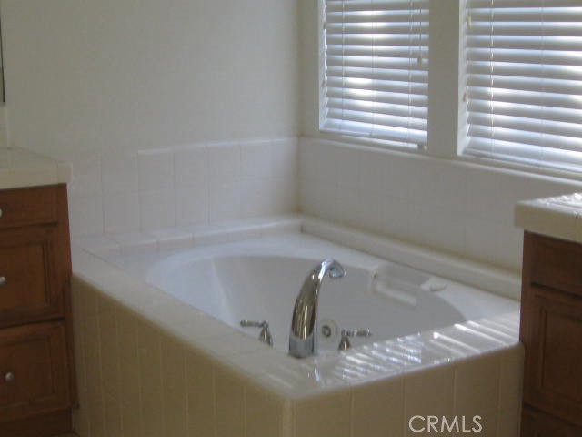 19 Coriander Irvine, CA 92603 - Photo 39 of 40 a bath tub sitting in a bathroom